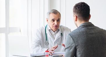 a man at the appointment of a specialist